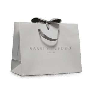 Art paper bag with ribbon handles and ties